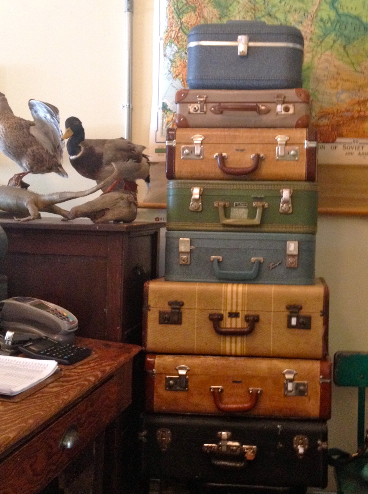 A stack of vintage suitcases